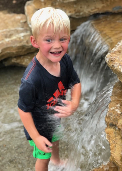 Children can splash in the water that flows over limestone rocks that mimic a natural freshwater Kentucky stream.